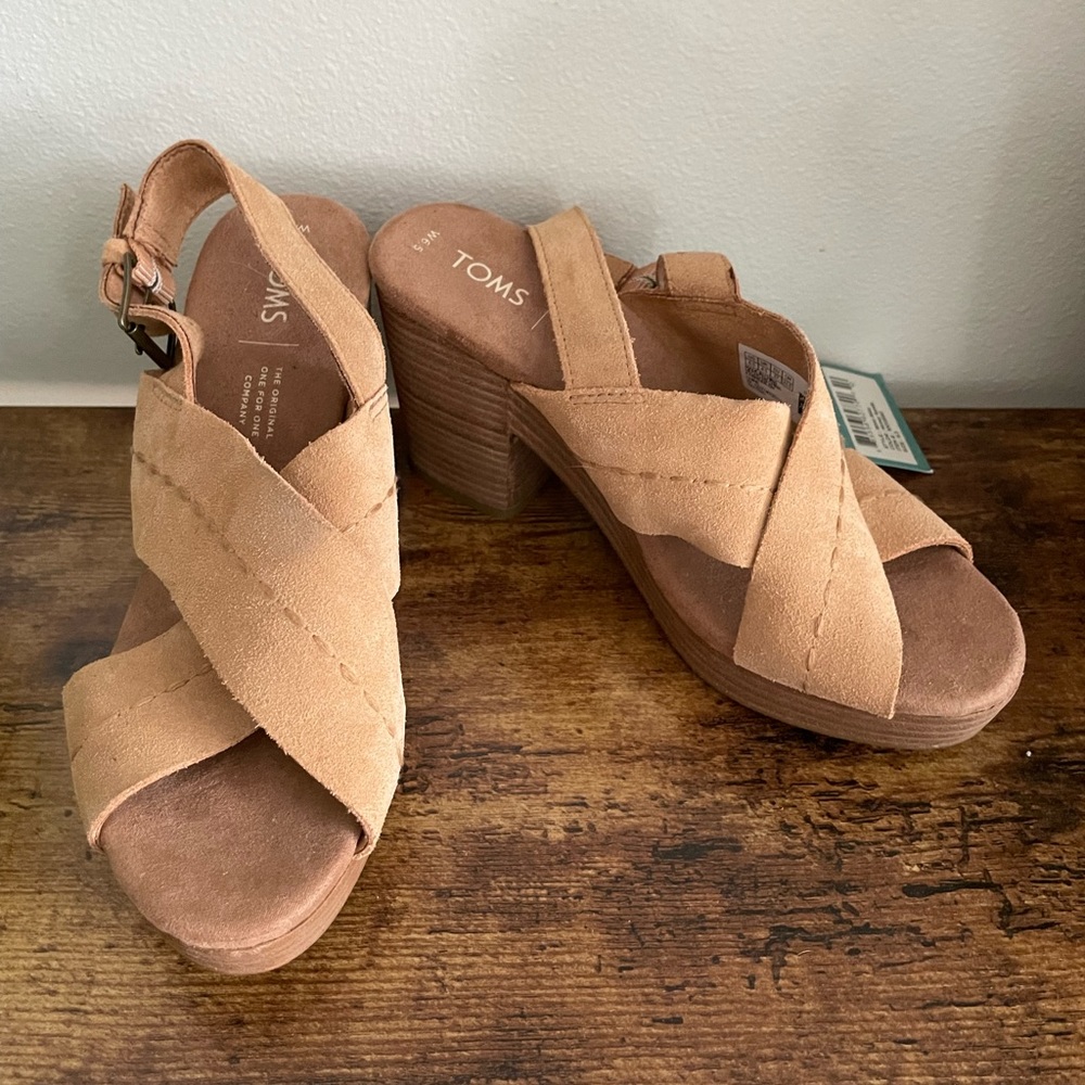Tom’s Ibiza wedge sandals. Never worn so 6 1/2 in women’s.